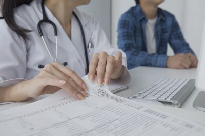 Doctor,To,Check,The,Medical,Records Doctor to check the medical records